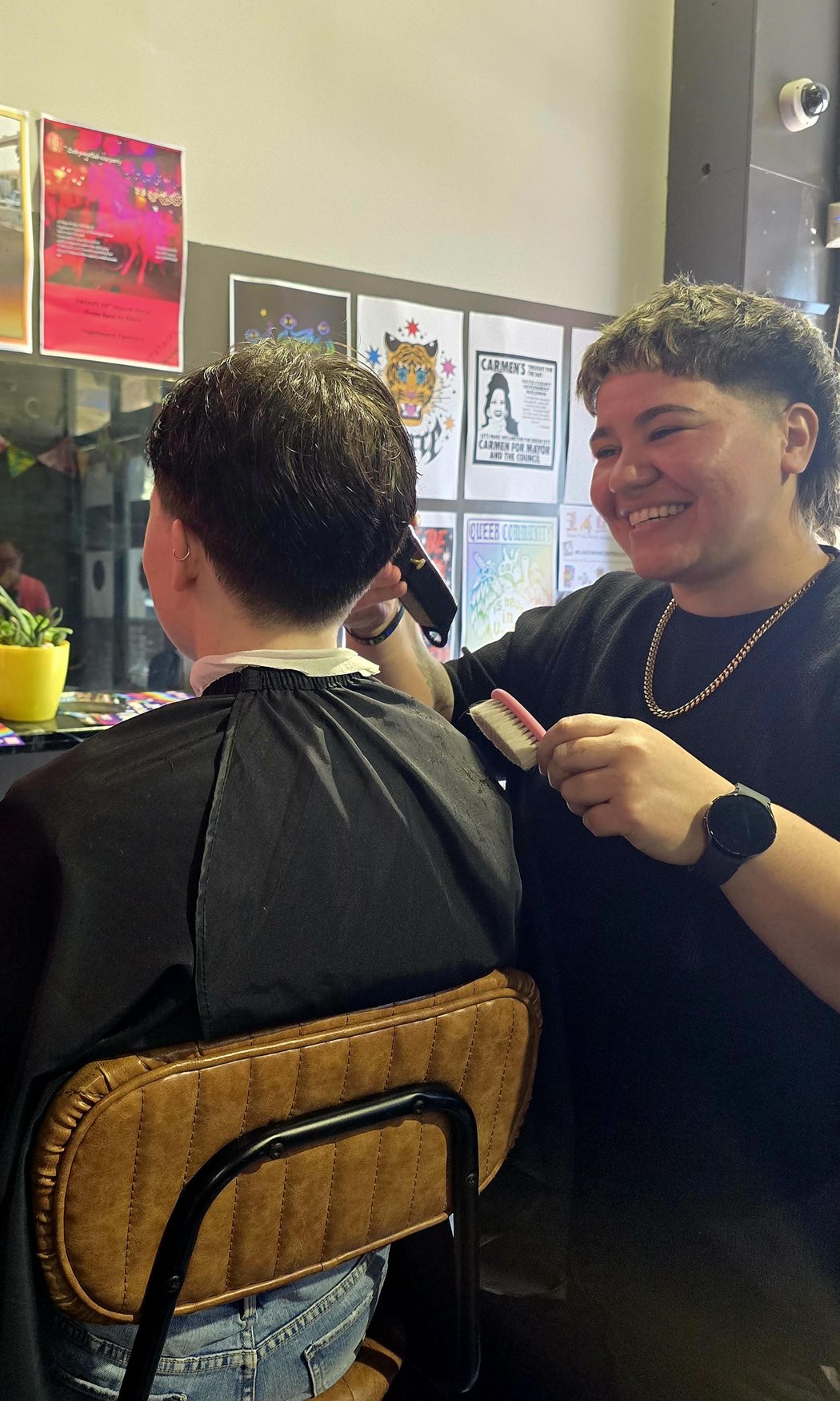 Portrait of Ruby, barber at Be Kind Barbers